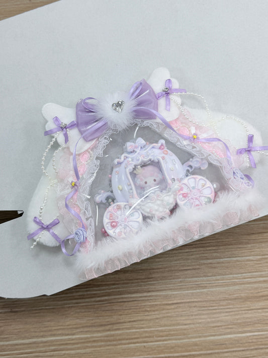 Handmade kawaii lavender heart squishy featuring princess carriage charm, white fur trim, lace ruffles and rhinestone bow