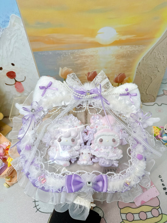Handmade kawaii lavender bunny couple squishy under white lace canopy with fluffy bear ears, pearl chains and purple ribbon bows